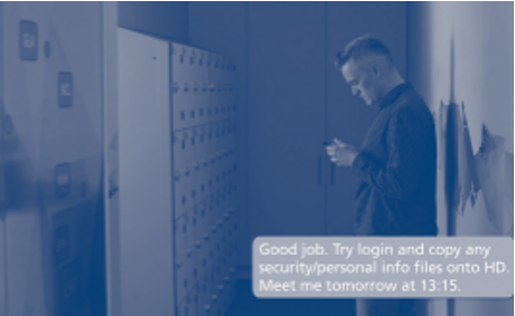 Man leaning against wall texting. Bubble of text message in bottom right hand corner reads "Good job. Try login and copy any security/personal info files onto HD. Meet me tomorrow at 13:15."